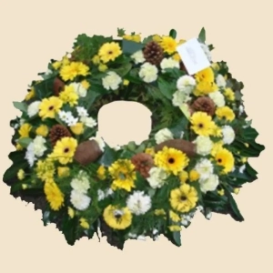 COURONNE A PLAT POMMES DE PIN JAUNE BLANCHE ET VERTE